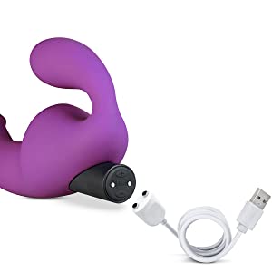 temptasia strapless strap on laying on side with bullet exposed showing magnetic charging